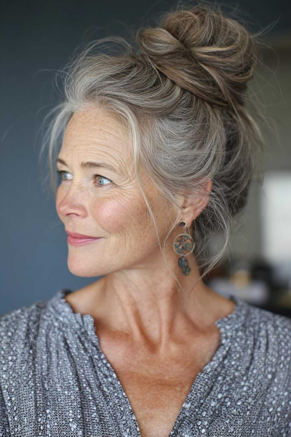 Classy Choices: 12+ Mother of the Groom Hairstyles (Updos, Bobs & Graceful Waves). - Messy Bun with Tendrils