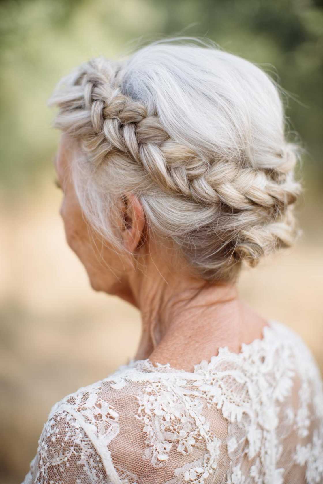 Classy Choices: 18+ Mother of the Groom Hairstyles (Updos, Bobs, Soft Waves). - 10. Braided Crown