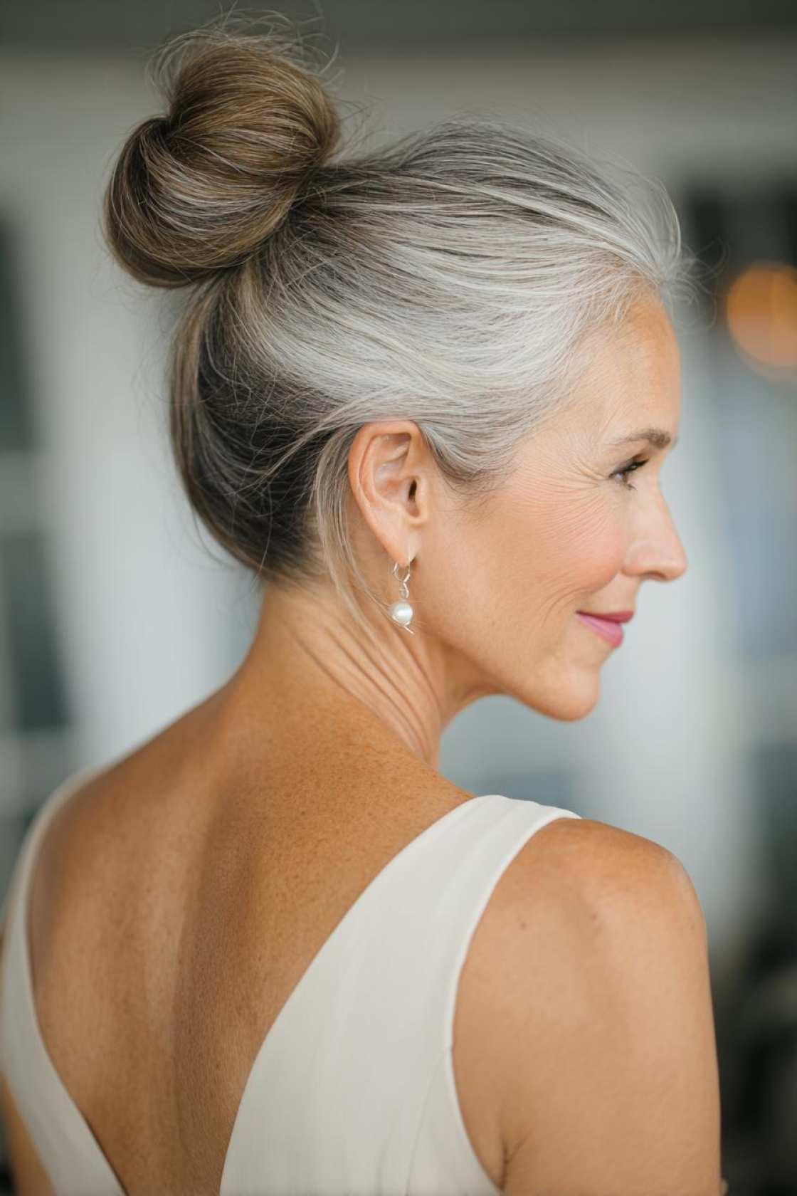 Classy Choices: 18+ Mother of the Groom Hairstyles (Updos, Bobs, Soft Waves). - 9. High Bun