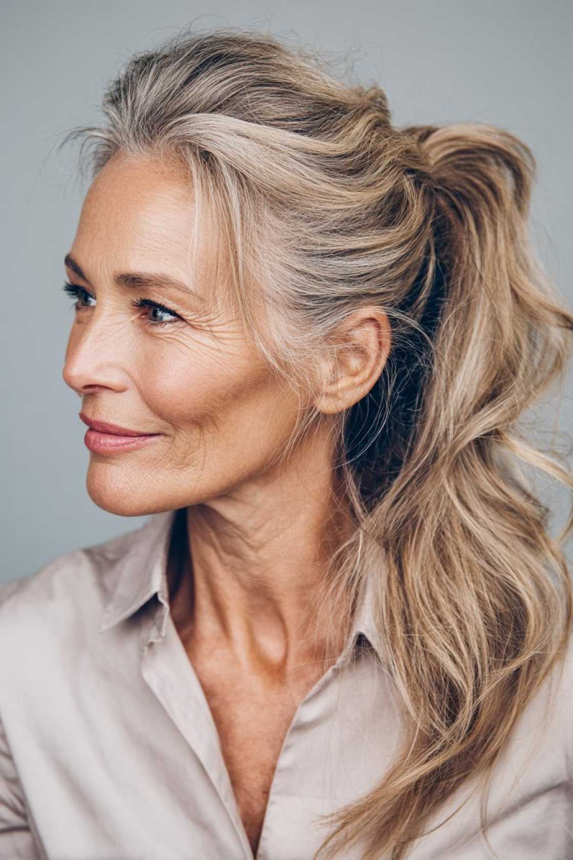 Classy Choices: 18+ Mother of the Groom Hairstyles (Updos, Bobs, Soft Waves). - 8. Ponytail with Waves