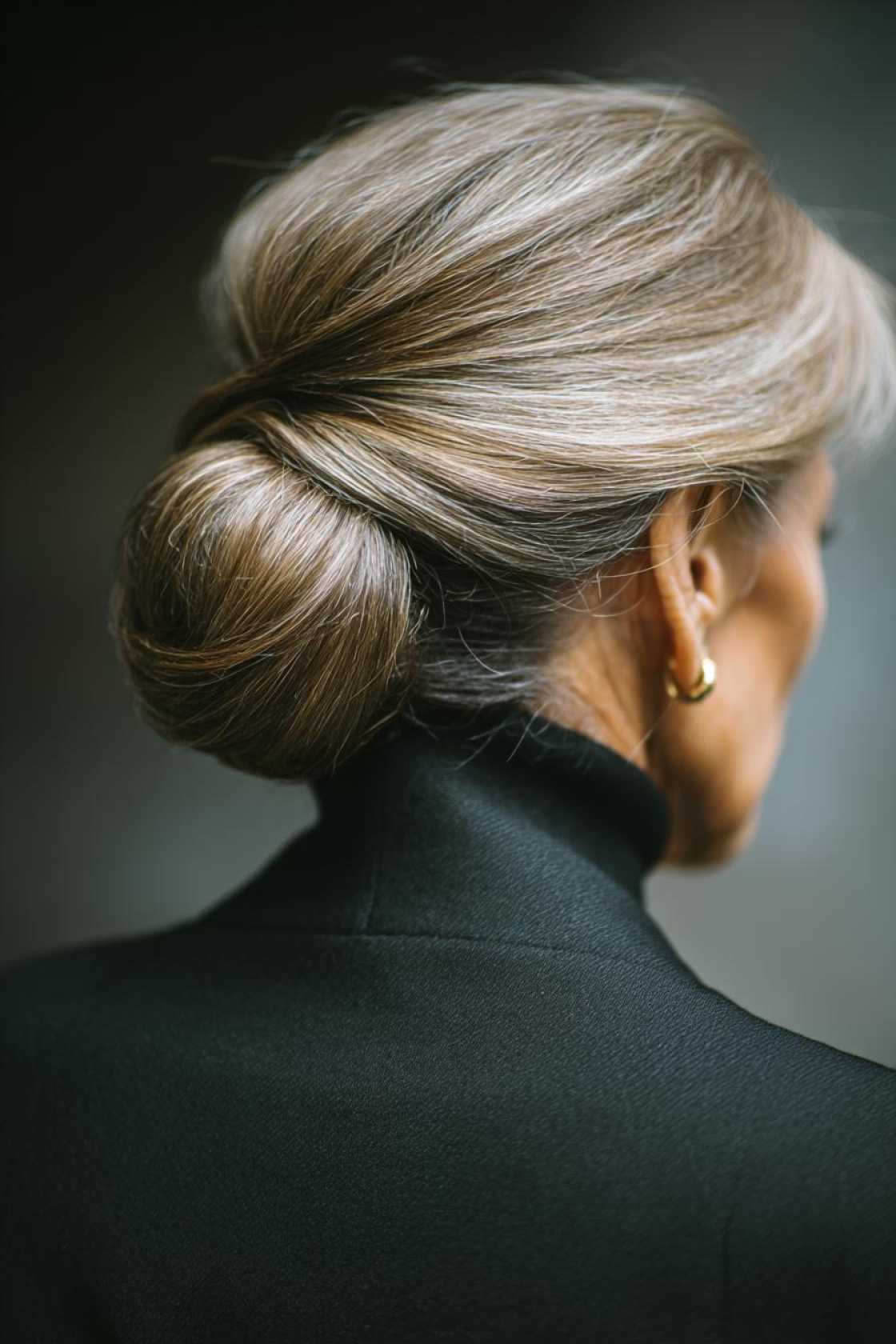 Classy Choices: 18+ Mother of the Groom Hairstyles (Updos, Bobs, Soft Waves). - 6. Chignon