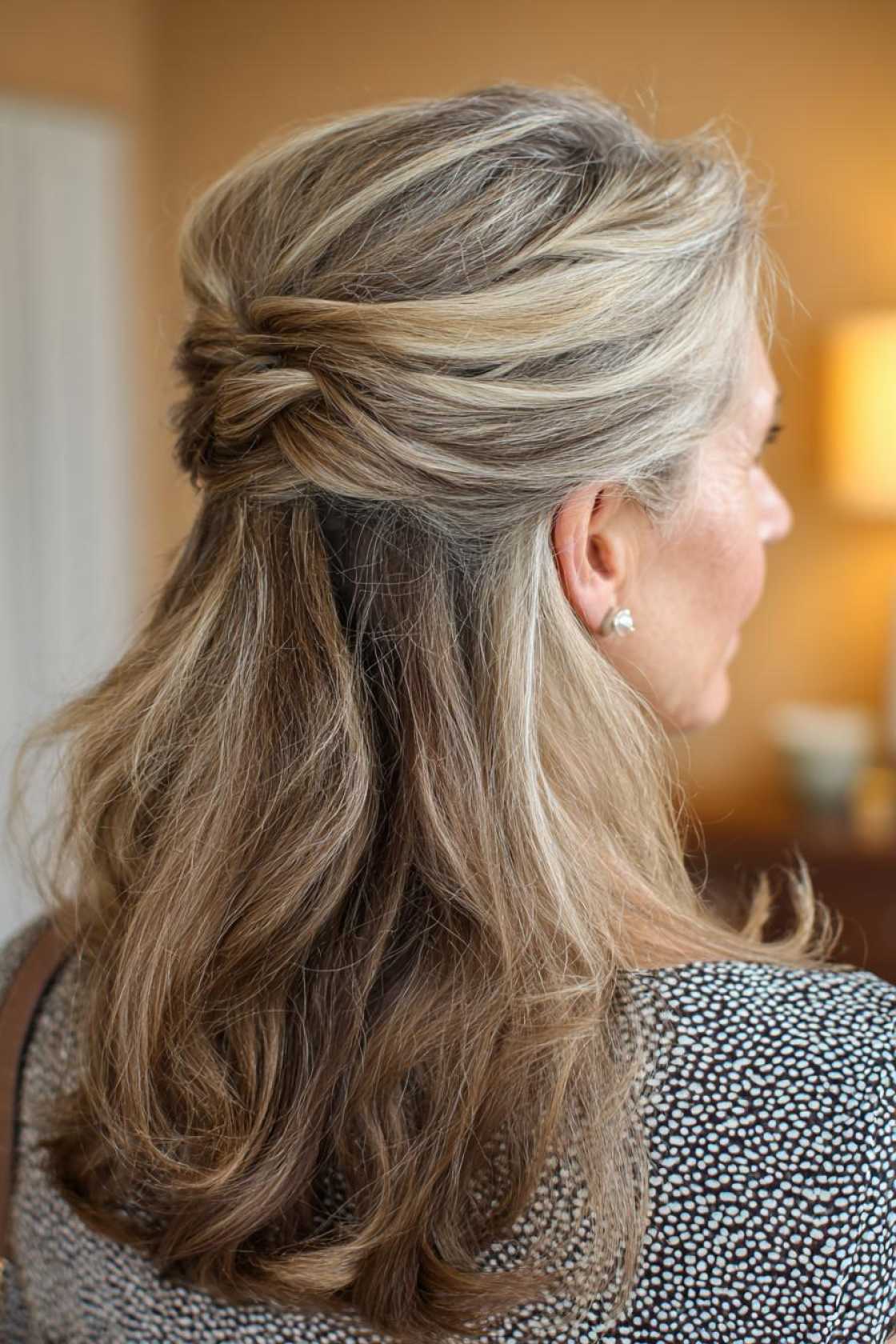 Classy Choices: 18+ Mother of the Groom Hairstyles (Updos, Bobs, Soft Waves). - 17. Half-Up, Half-Down with Braids