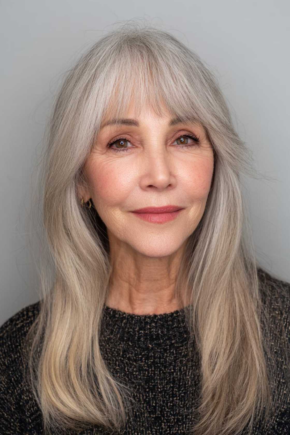 Flattering & Fabulous: 12+ Very Layered Medium Hairstyles Perfect for Over 50s. - 3. The Layered Cut with Curtain Bangs