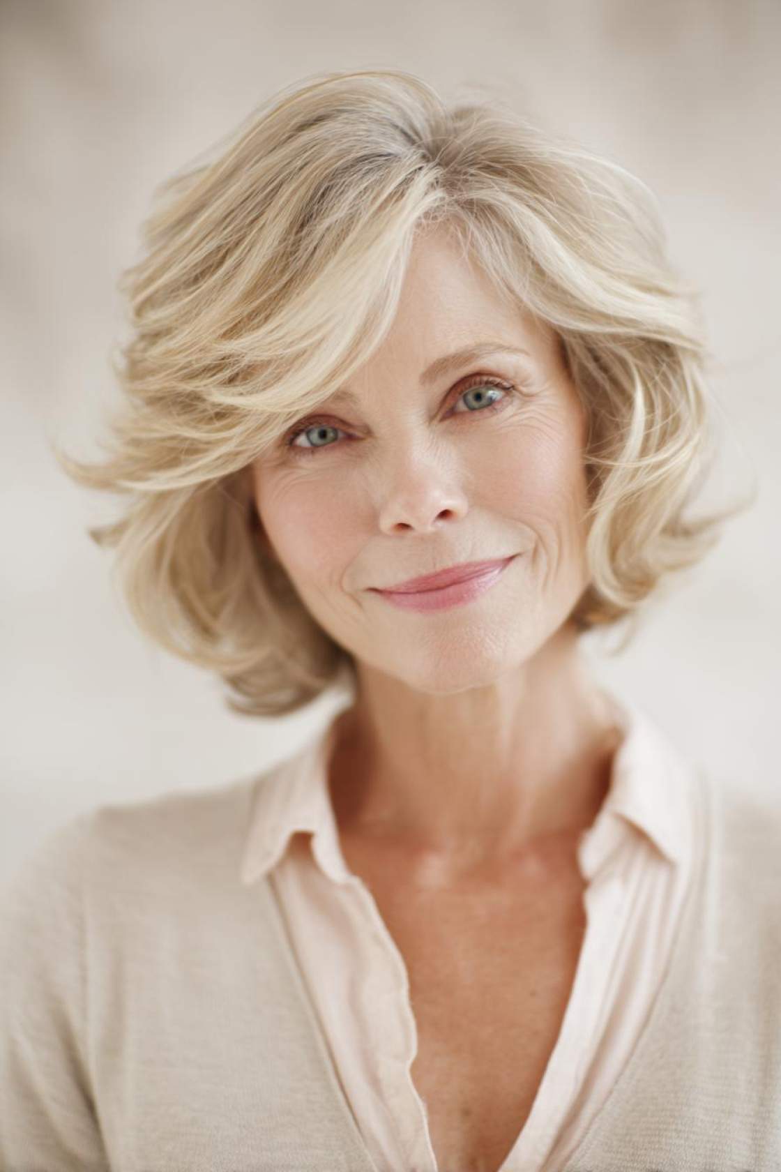 Flattering & Fabulous: 12+ Very Layered Medium Hairstyles Perfect for Over 50s. - 5. The Classic Layered Cut for Volume
