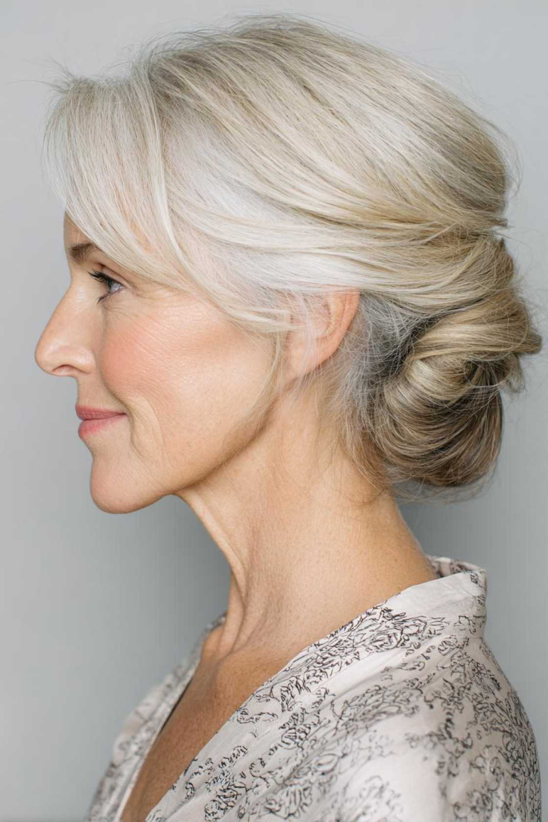 From Short Bobs to Elegant Updos: 15+ Flattering Hairstyles for the Mother of the Groom. - 13. Low Bun with Volume