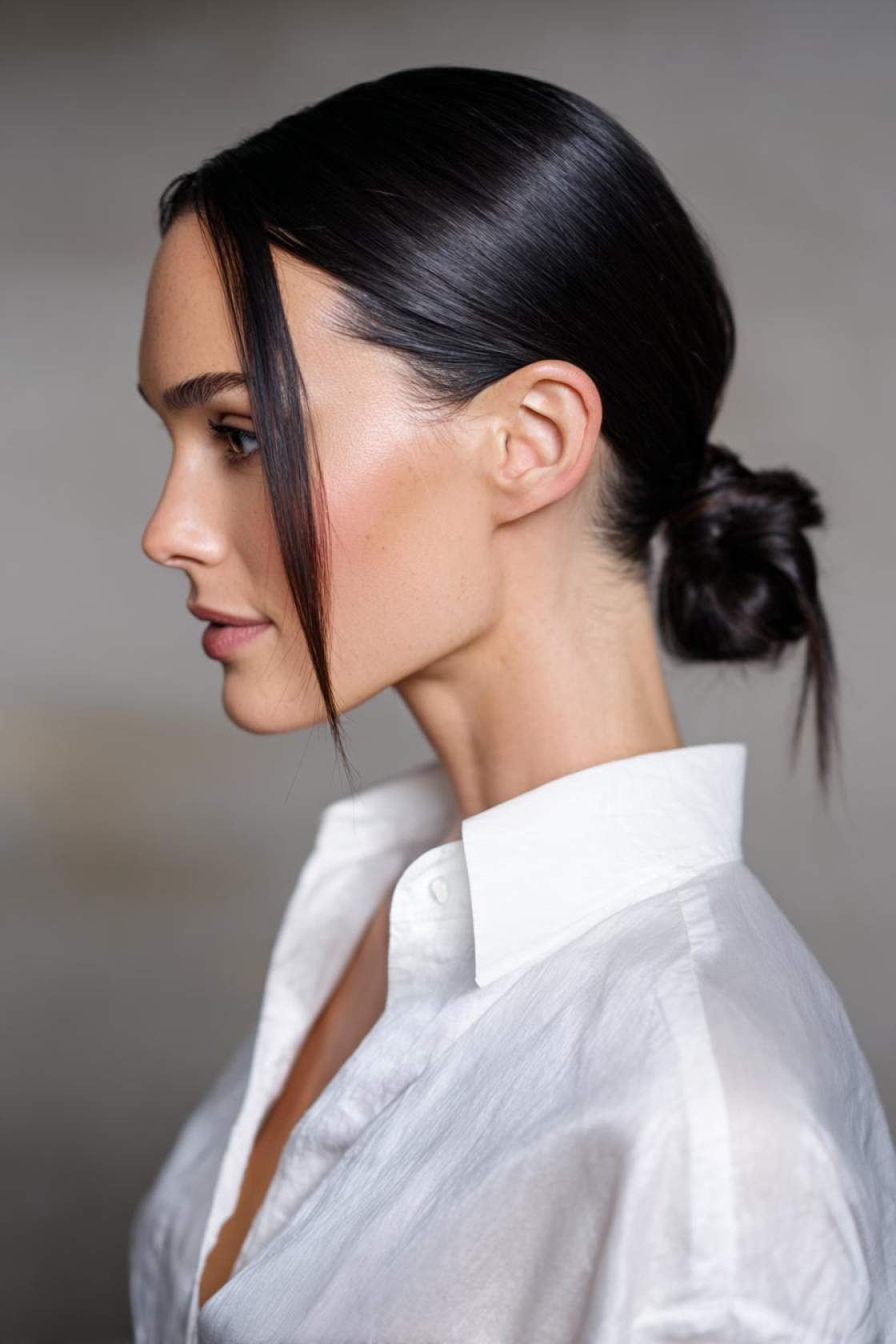 From Summer Breeze to Autumn Leaves: 18+ Transition Hair Ideas for Fall. - 3. Low Ponytail with a Twist