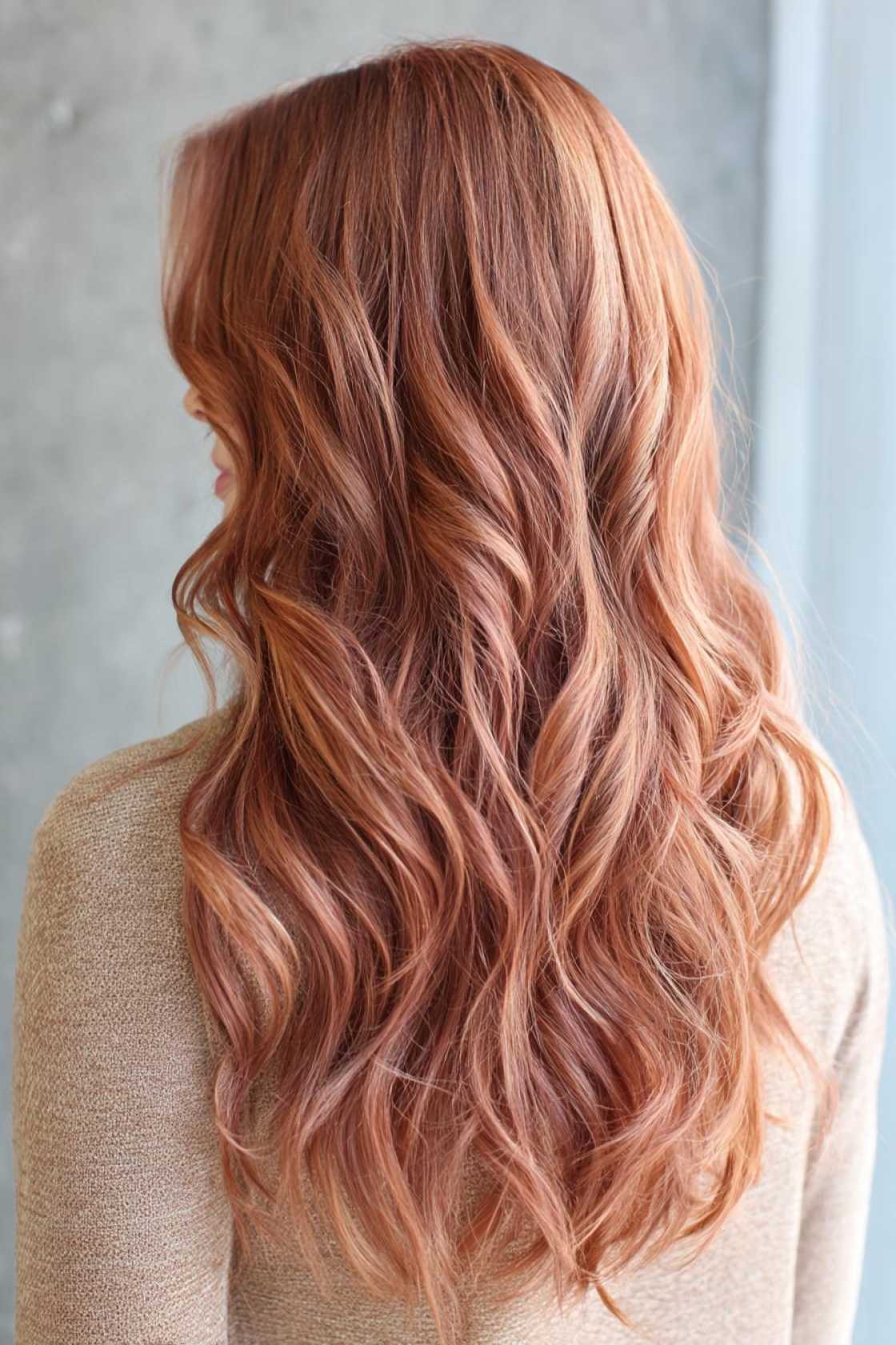 Is Rose Gold Your Next Hair Adventure? 18+ Inspiring Looks to Consider. - 4. Rose Gold on Wavy Hair