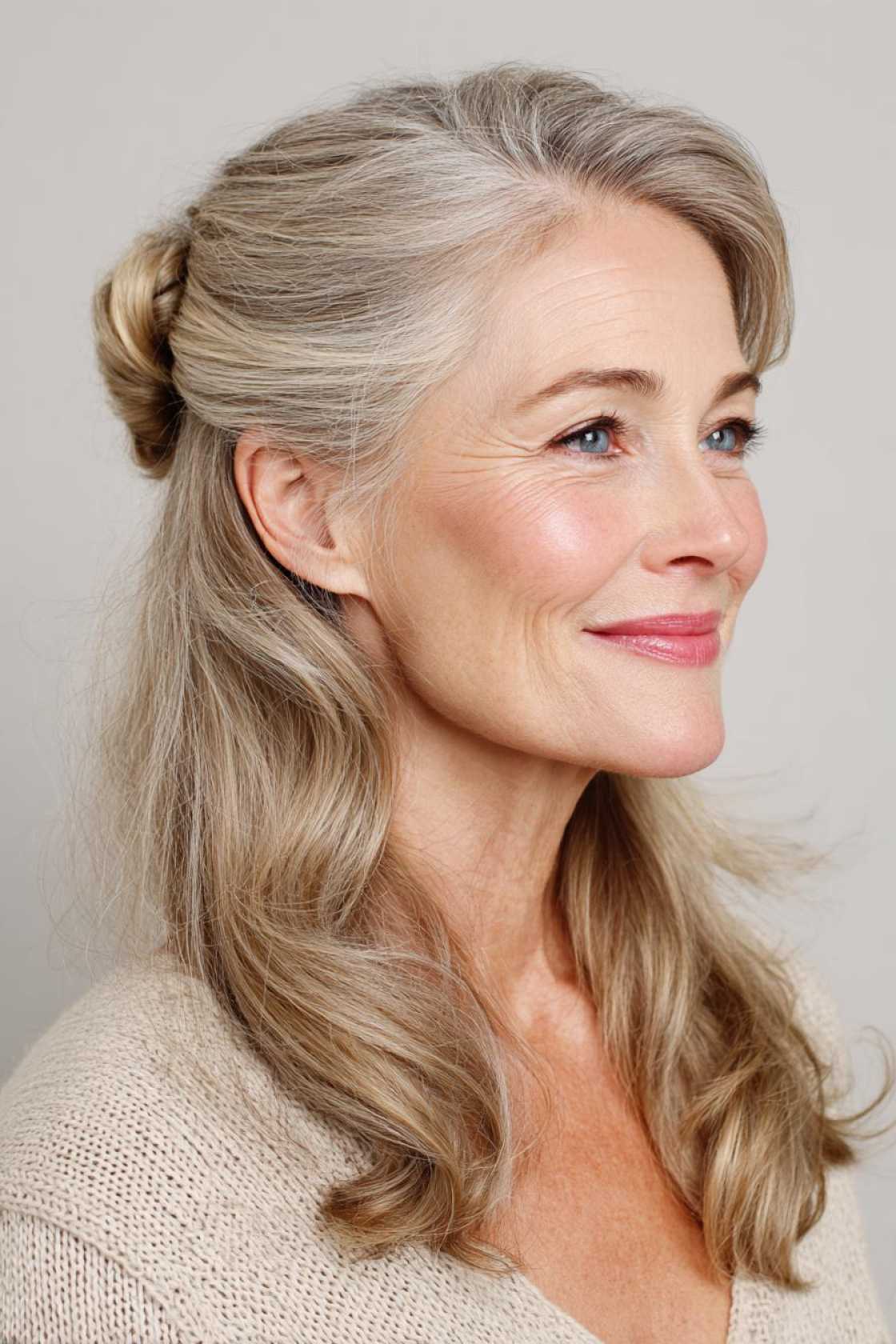 Long Hair, Don't Care (About Age!): 20+ Chic Long Hairstyle Ideas for Women Over 50. - 12. Half-Up Half-Down with Twist