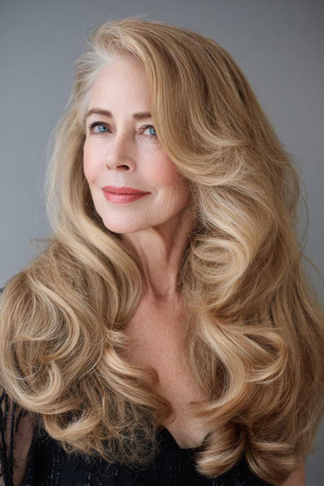 Long Hair, Don't Care (About Age!): 20+ Chic Long Hairstyle Ideas for Women Over 50. - 1. The Voluminous Blowout