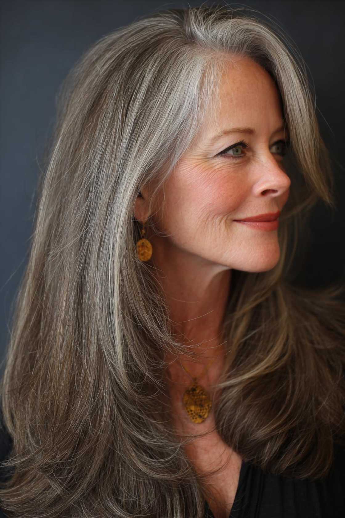 Long Hair, Don't Care (About Age!): 20+ Chic Long Hairstyle Ideas for Women Over 50. - 17. Layered Cut with Face-Framing Pieces