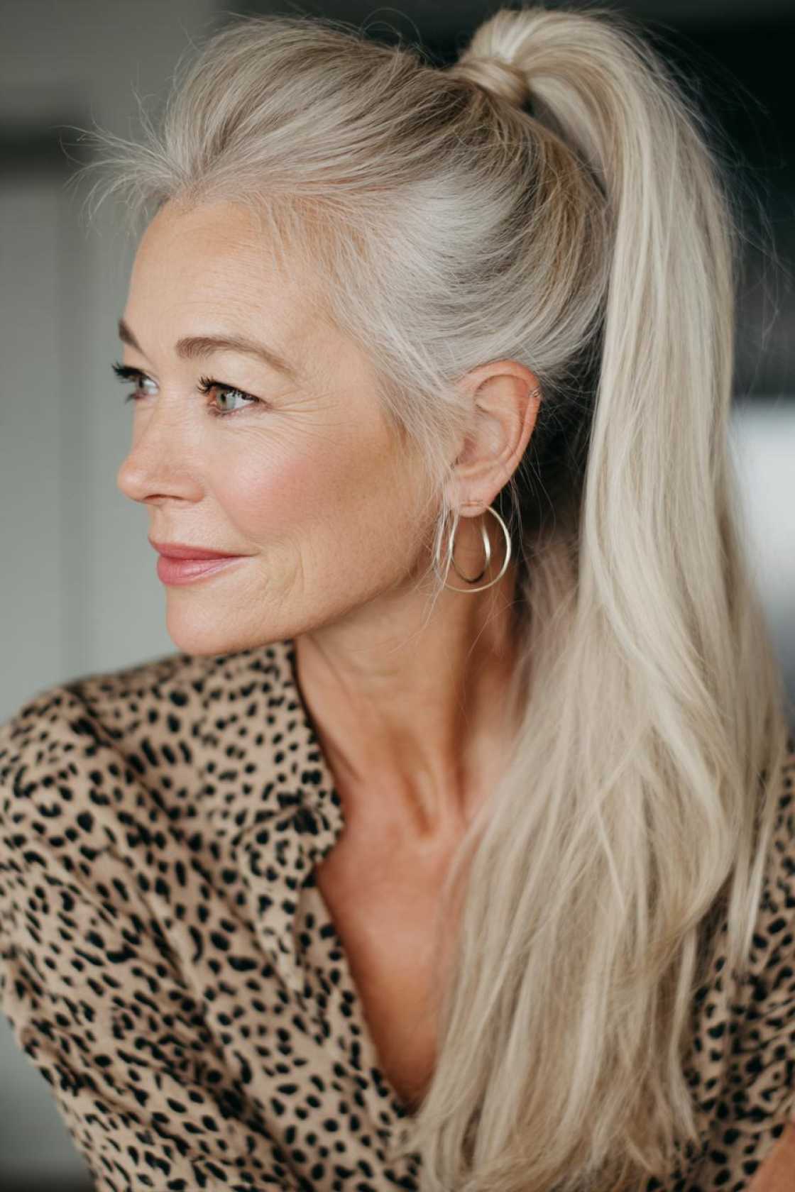 Long Hair, Don't Care (About Age!): 20+ Chic Long Hairstyle Ideas for Women Over 50. - 14. High Ponytail with Volume