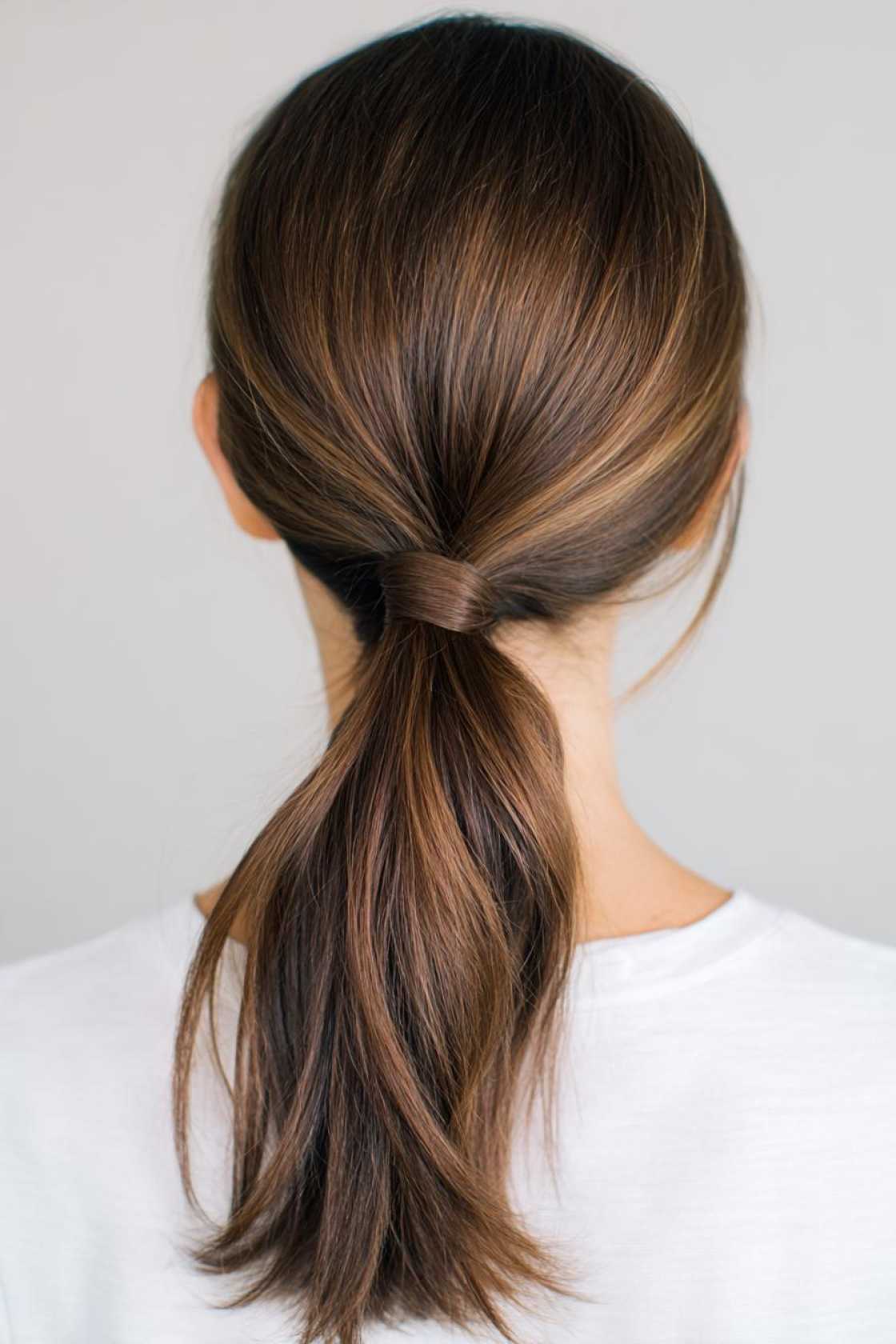 Look Great on the Go: 20+ Practical (and Pretty!) Mom Hairstyles. - 22. The Simple Low Ponytail