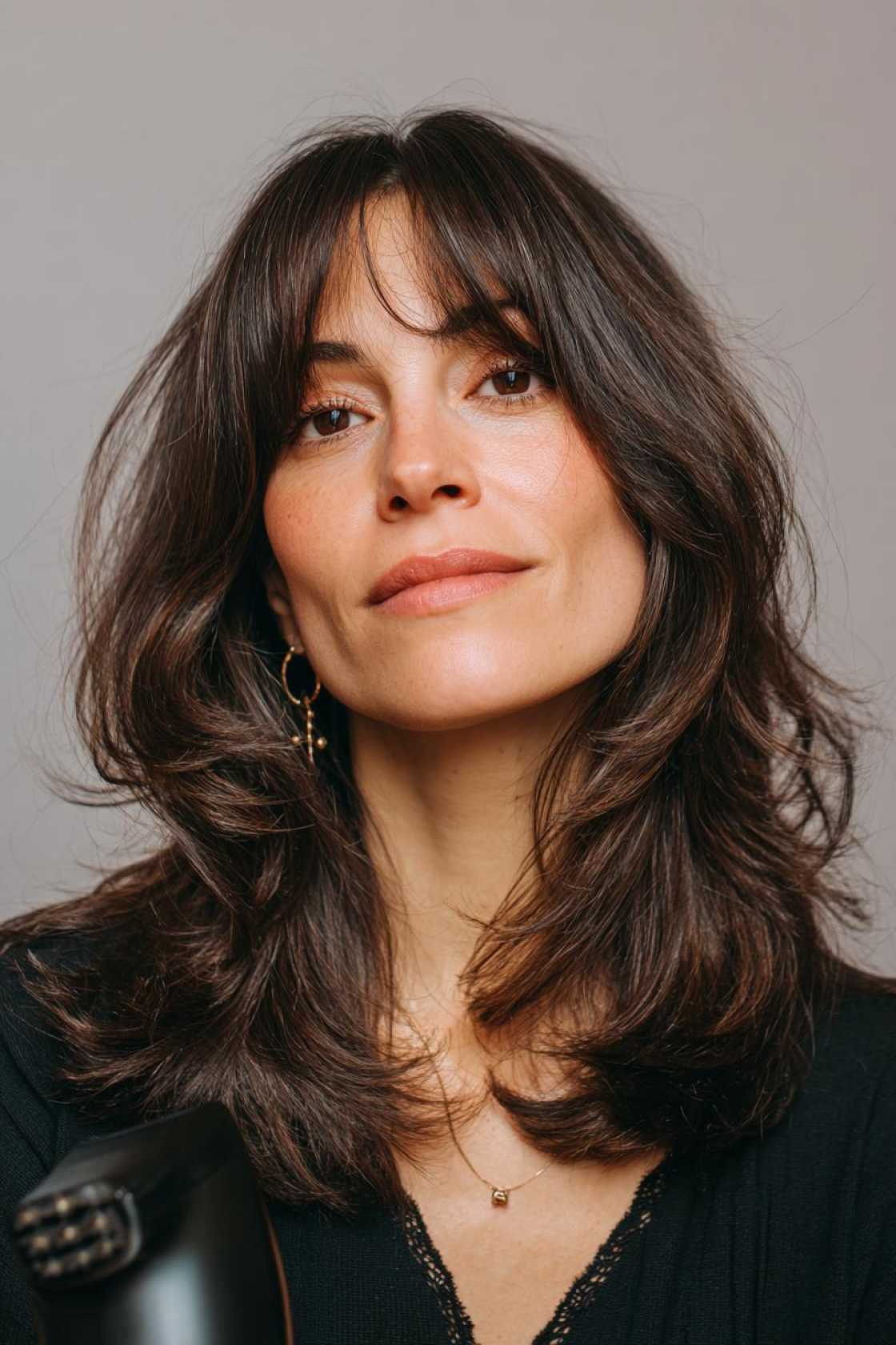 Refresh Your Look After 40: 25+ Stunning Medium Length Hairstyle Inspirations. - 14. Mid-Length with Curtain Bangs