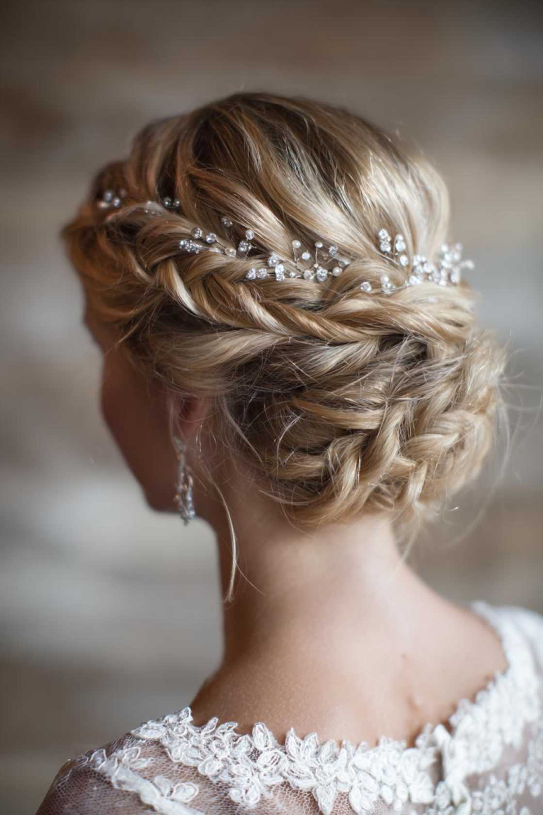Sun-Kissed & Stunning: 15+ Summer Wedding Hairstyles for the Radiant Bride. - 12. Braided Crown Updo