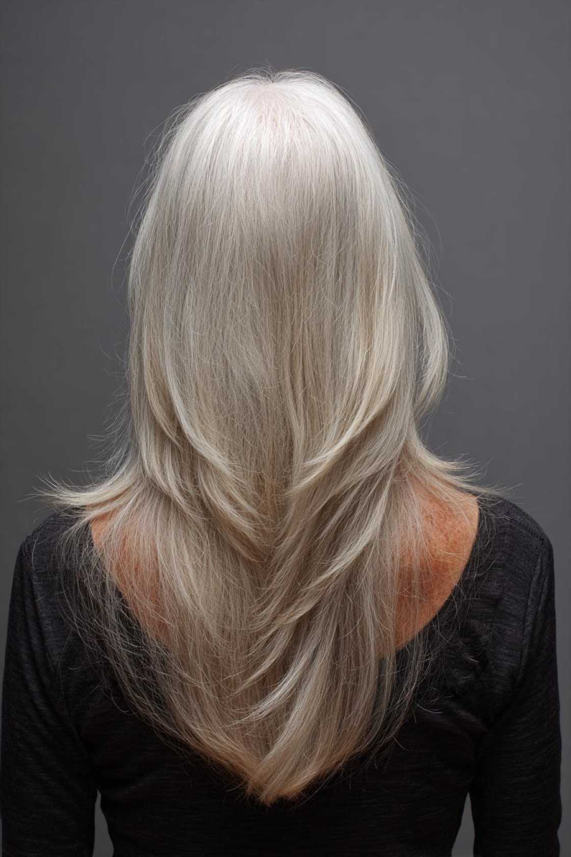 The 2025 Edit: 20+ Chic & Modern Long Haircuts for Women Over 50 (and Beyond!). - 7. The Long Hair with a V-Shape