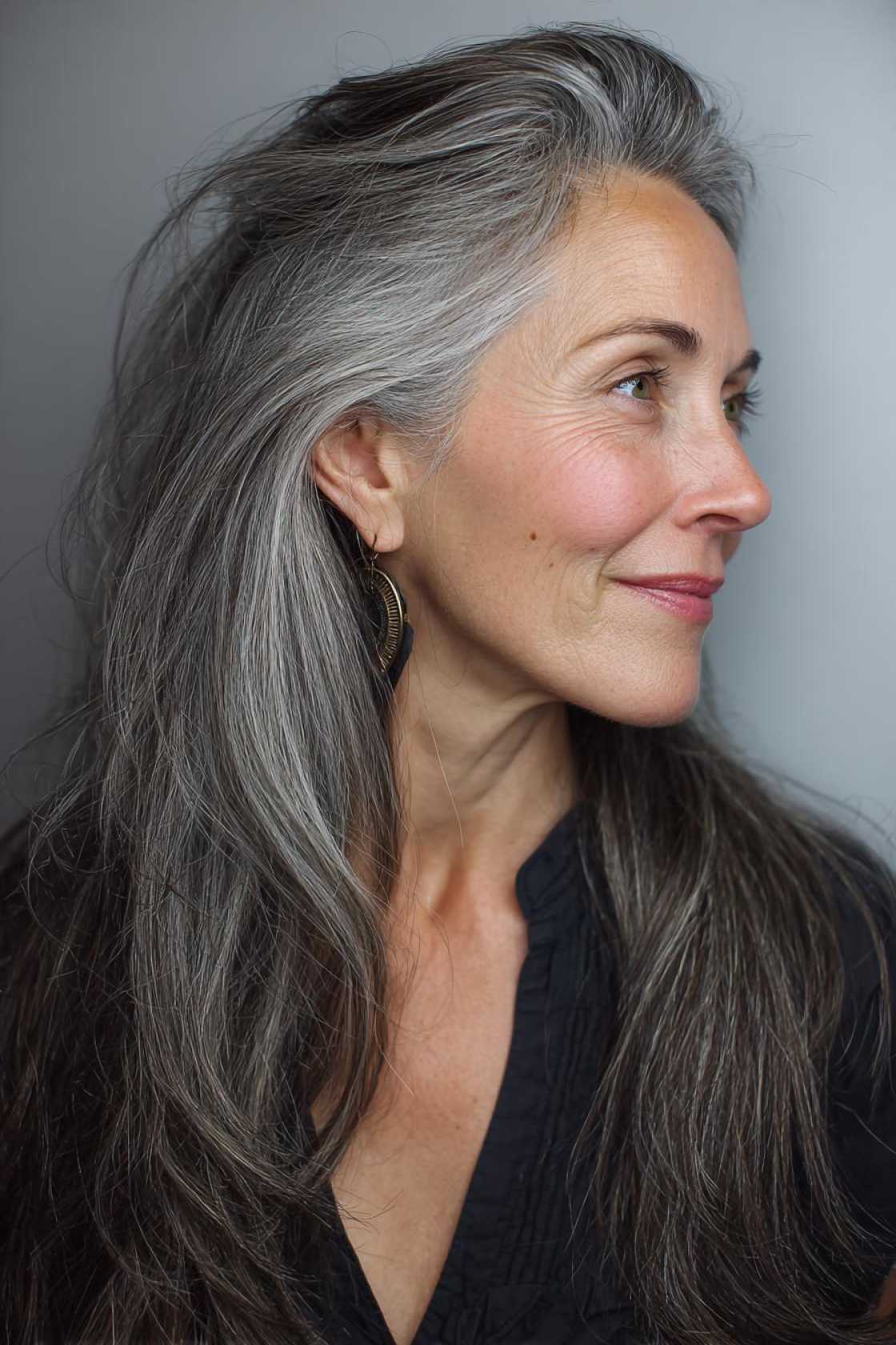 The 2025 Edit: 20+ Chic & Modern Long Haircuts for Women Over 50 (and Beyond!). - 6. The Long Hair with a Few Long Layers