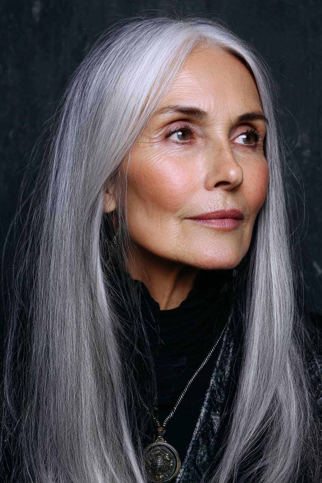The 2025 Edit: 20+ Chic & Modern Long Haircuts for Women Over 50 (and Beyond!). - 14. The Blunt Cut with a Center Part