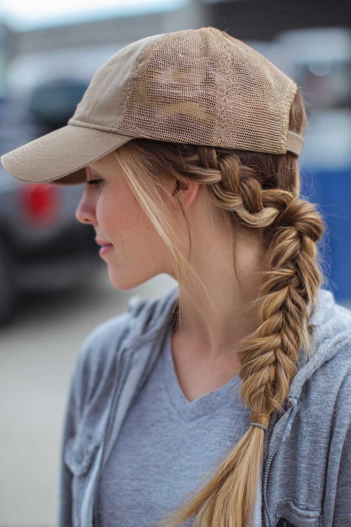 Your Go-To Guide for Game Day Glam: 12+ Baseball Hat Hairstyles That Always Win. - 4. Braided Ponytail