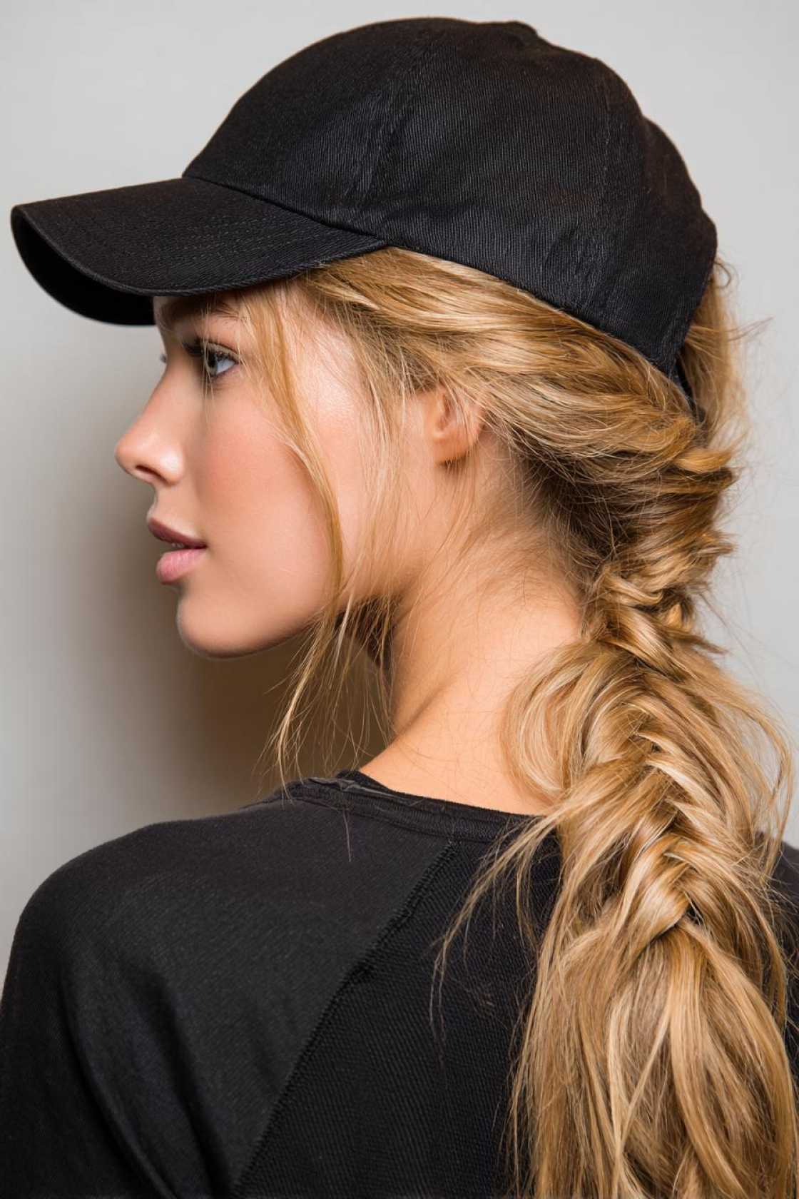 Your Go-To Guide for Game Day Glam: 12+ Baseball Hat Hairstyles That Always Win. - 3. Twisted Ponytail