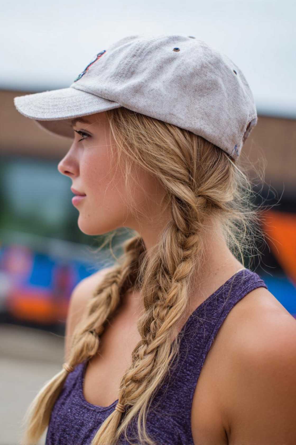 Your Go-To Guide for Game Day Glam: 12+ Baseball Hat Hairstyles That Always Win. - 12. Double Braids
