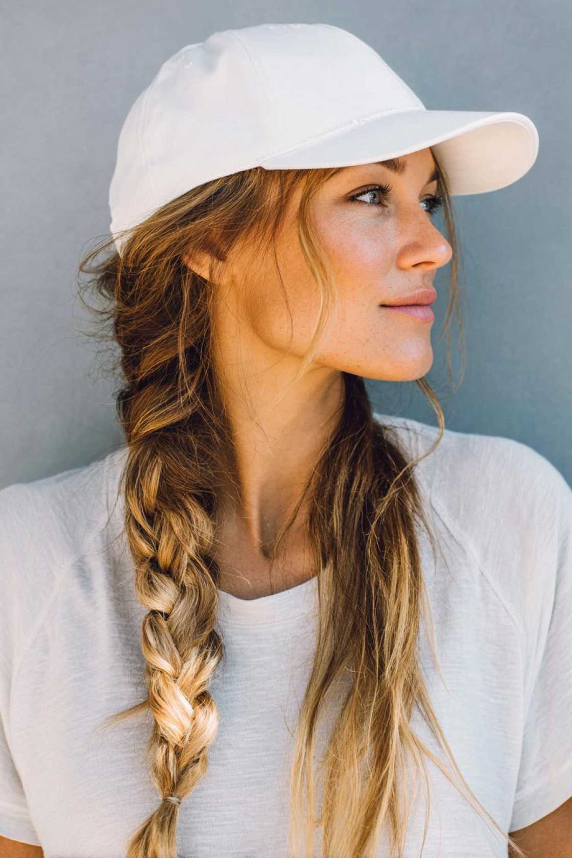 Your Go-To Guide for Game Day Glam: 12+ Baseball Hat Hairstyles That Always Win. - 11. Side Braid