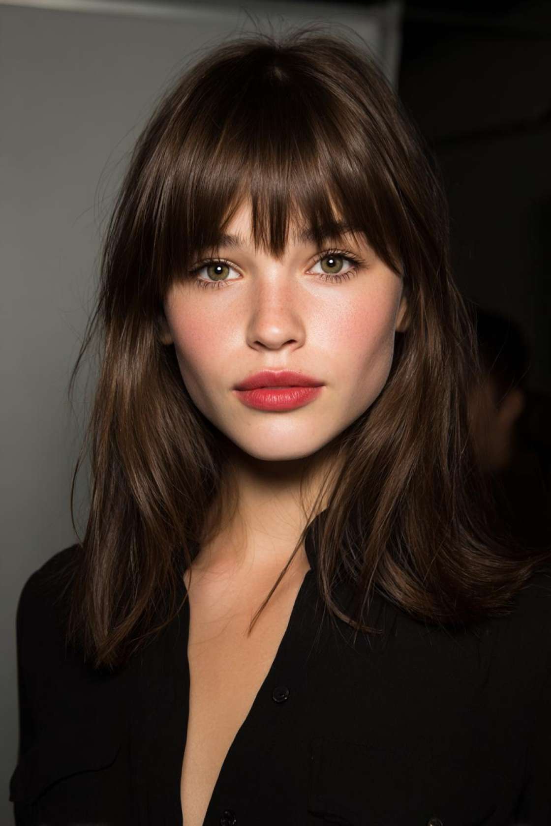 Your Spring 2025 Hair Refresh: 20+ Chic Medium-Length Cut Ideas to Inspire. - 13. Mid-Length Cut with Full Bangs