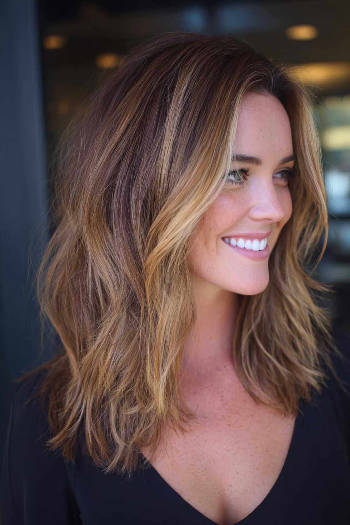 Your Spring 2025 Hair Refresh: 20+ Chic Medium-Length Cut Ideas to Inspire. - 7. Mid-Length Cut with Highlights