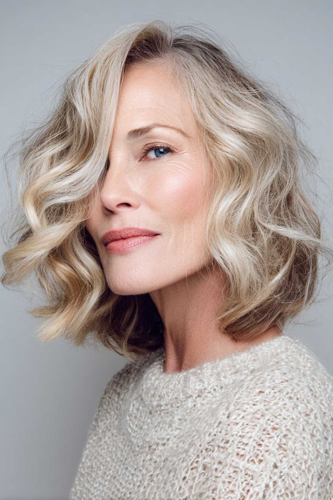 Your Summer 2025 Style Refresh: 20+ Youthful Haircuts for Women Over 50. - 3. The Wavy Lob with Highlights