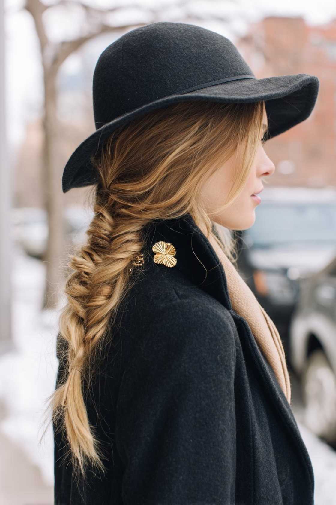 From Beanie-Proof Braids to Sleek Buns: 13+ Winter Hair Ideas to Try - 14. The Low Messy Bun