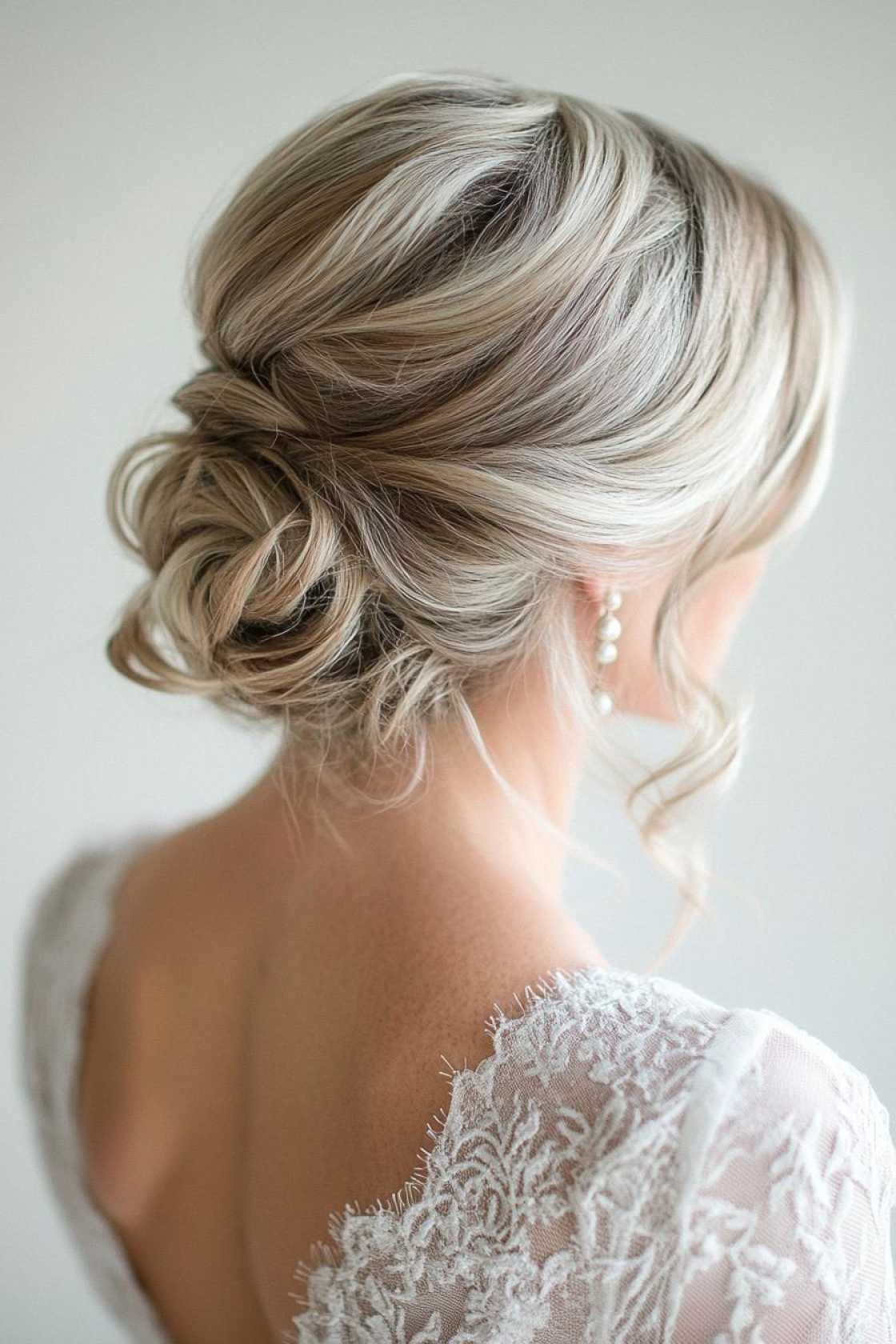 13+ Mother of the Bride Hairstyles That Feel Elegant Timeless and Modern - The Messy Bun with a Sophisticated Edge