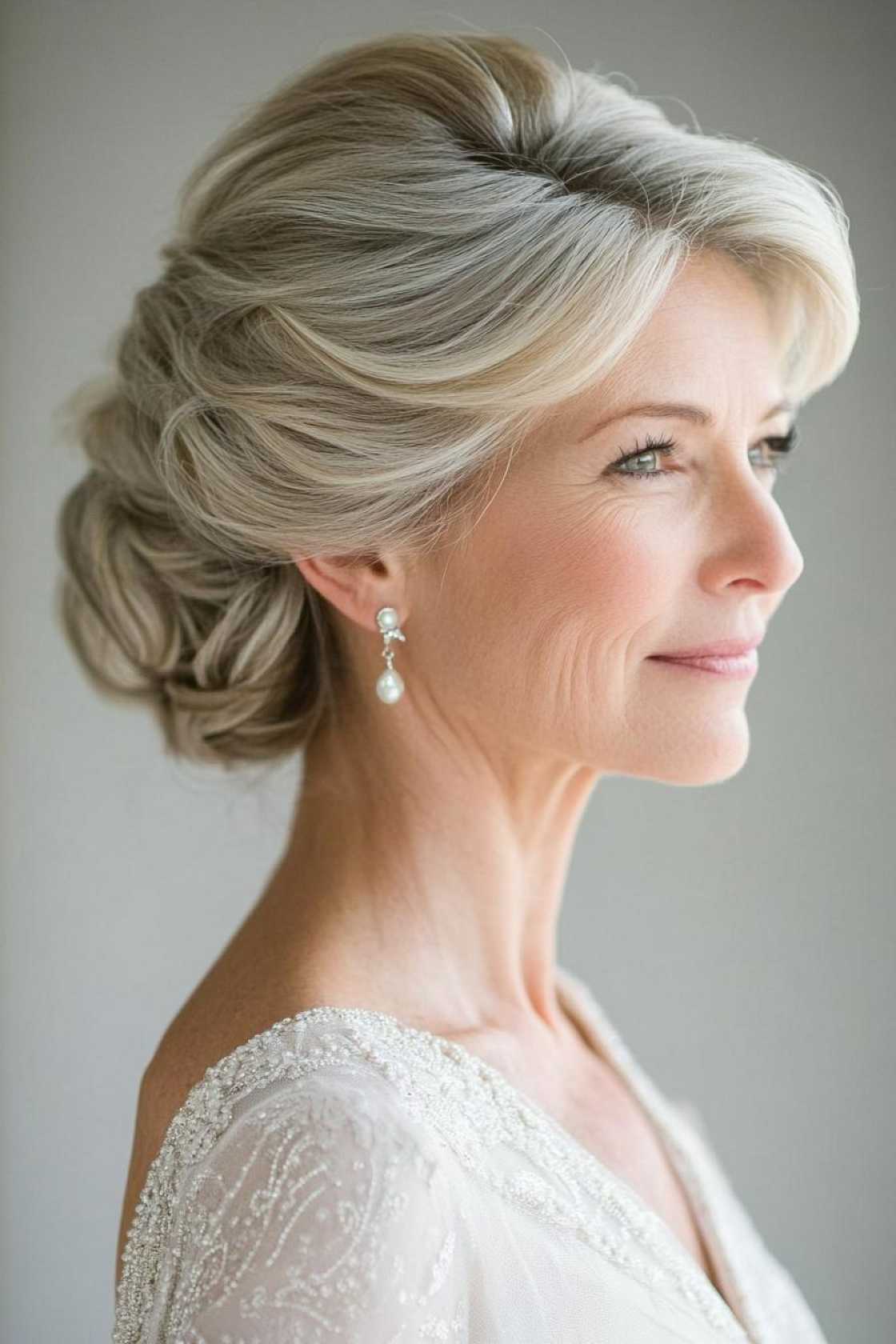 13+ Mother of the Bride Hairstyles That Feel Elegant Timeless and Modern - Ella Kohn's Top Pick: The Classic Chigno